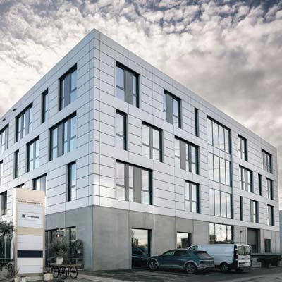 The picture shows the office building in Wolfurt, where the branch of crossbase mediasolution GmbH is located.